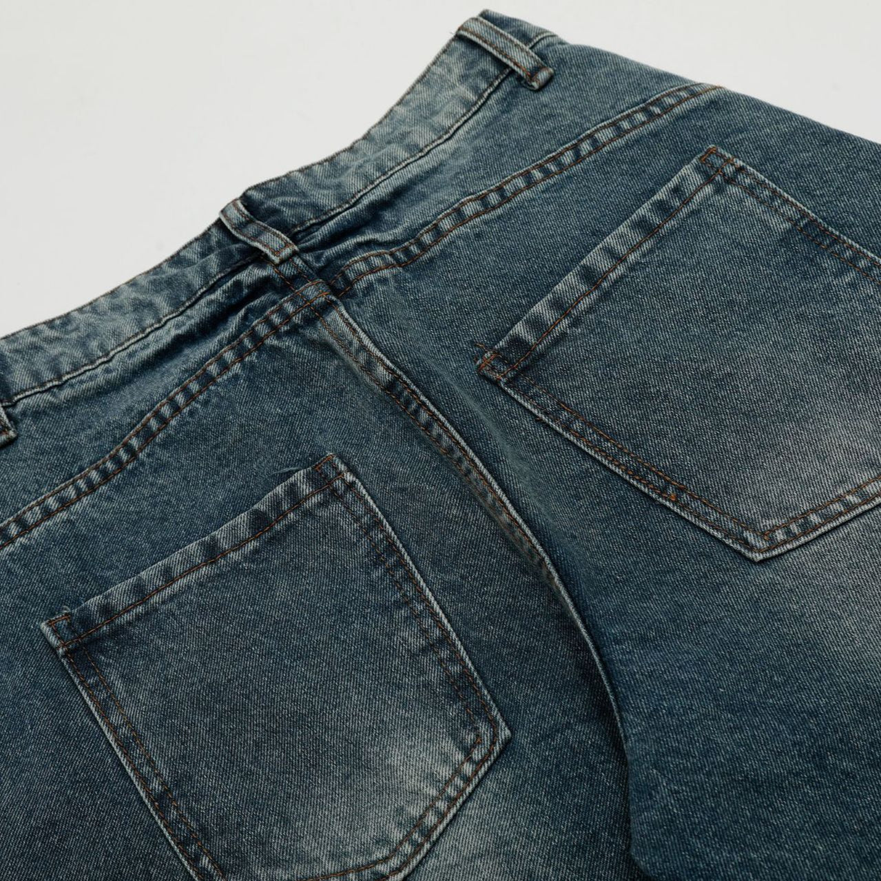 Blue Orbiform Arc Statement Denim