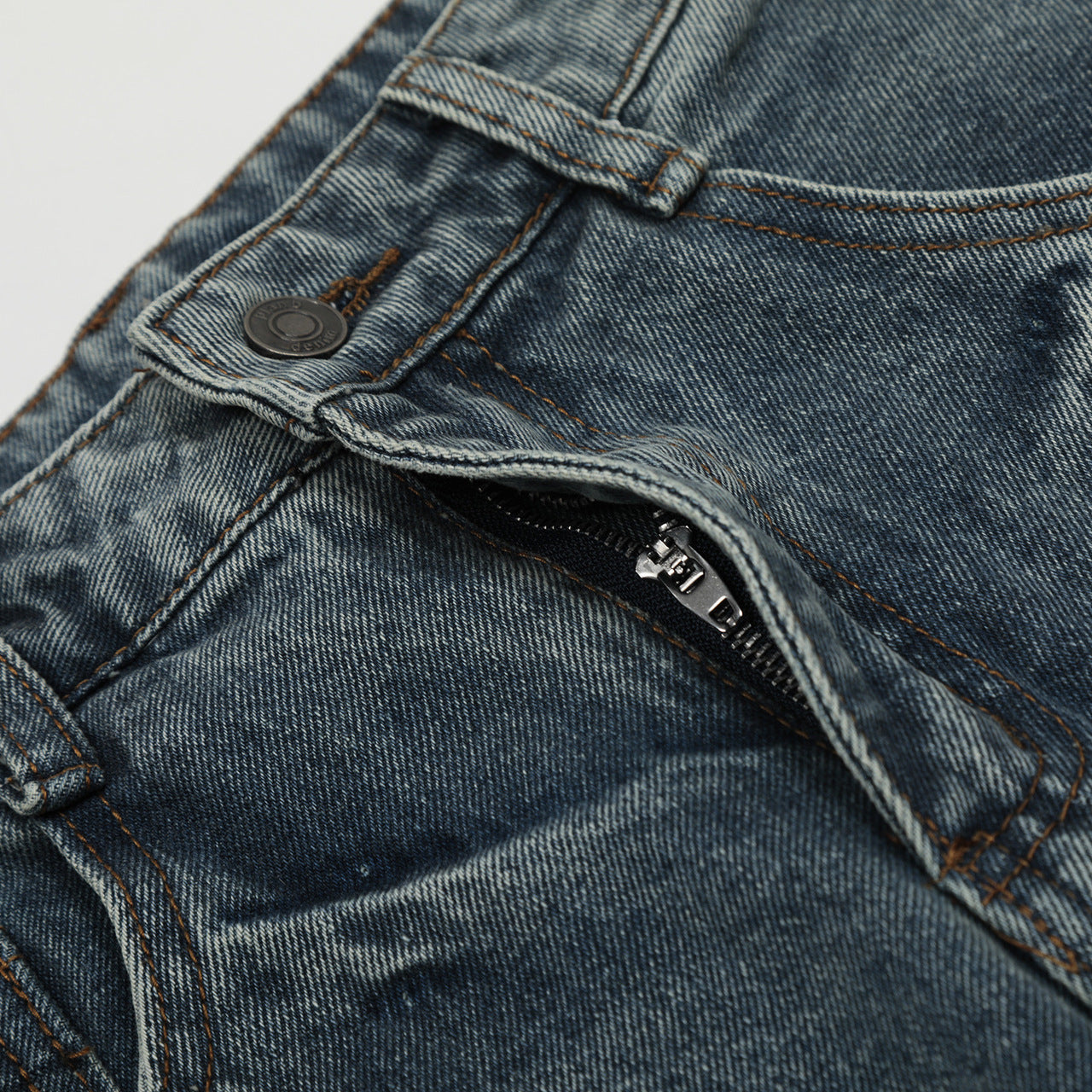 Blue Orbiform Arc Statement Denim